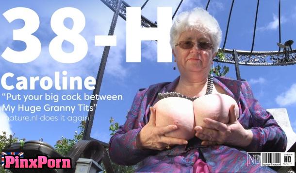 Granny Caroline V with a cup size of 38 plays with Her Massive Tits and Talks Dirty in the Garden